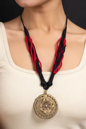 Handcrafted Golden Floral Dokra Pendant Necklace with Adjustable Red Black Dori for Women